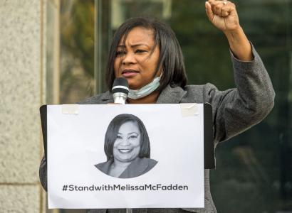 Lt. McFadden with her fist in the air