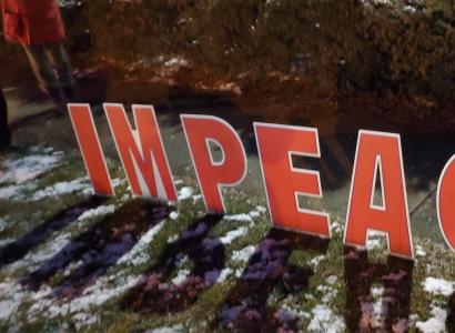 Word IMPEACH in big red letters