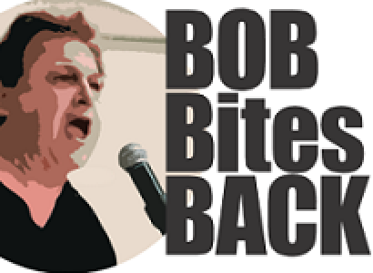 Words Bob Bites Back and a white man head and shoulders with black hair and black shirt shouting into a mic