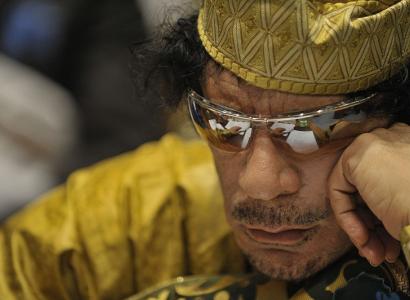 Close up of Qaddafi in sunglasses