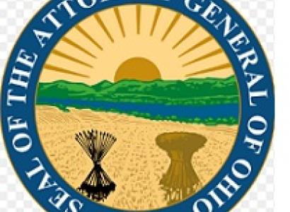 Round circle logo with thick blue outline  and words Seal of the Attorney General of Ohio and inside a sun, hill, river, corn bushel