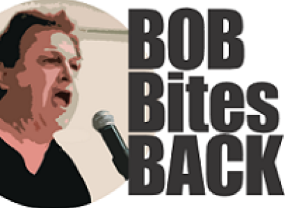 White man with black hair with his mouth open yelling into a mic and the words Bob Bites Back