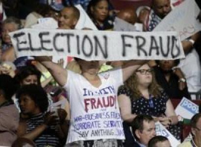 Bernie delegates holding up Election Fraud sign at DNC
