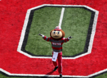 Brutus Buckeye on the football field