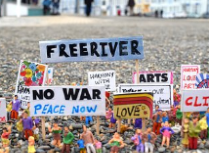  Bunch of peace and no war signs at the large outdoor area