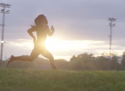 Silhouette of woman running