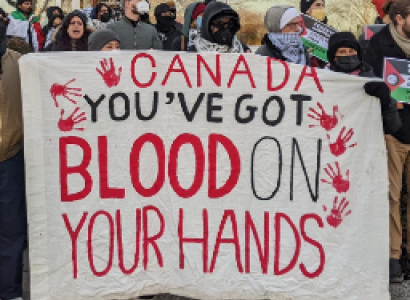 Sign saying Canada You've Got Blood on your Hands