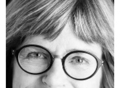 White woman with glasses