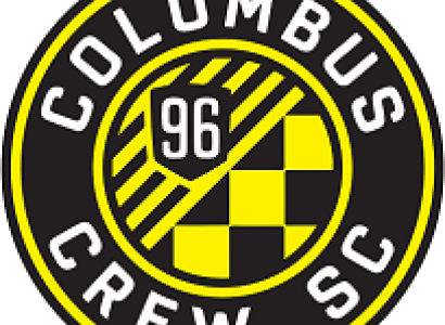 Round circle with mostly black background words Columbus Crew SC around the edges and in the middle a yellow checkered and striped symbol with a 96 on it
