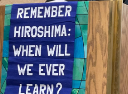 David speaking at podium