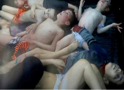 Kids lying on ground looking like they are dead