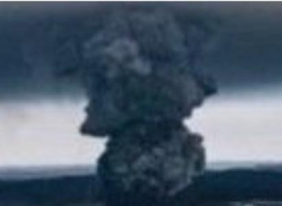 Smoke billowing in the air from explosion