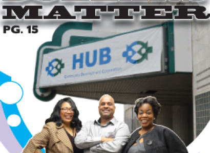 Three people standing in front of HUB