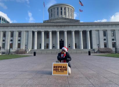 Statehouse and Repeal HB6 sign