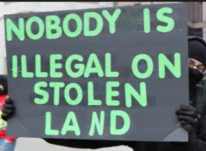 Sign saying Nobody is illegal on stolen land