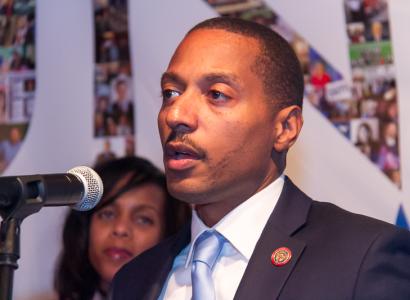 Kevin Boyce talking into a mic