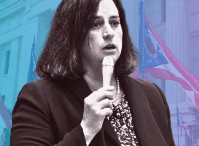 White woman with a mic