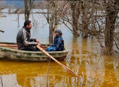 Two people in a rowboat