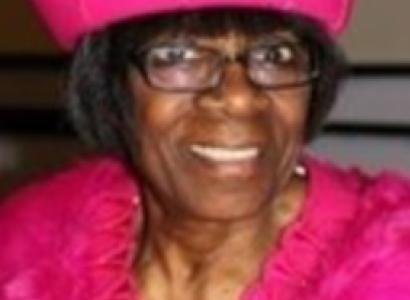 Margie Daffey in a bright pink outfit