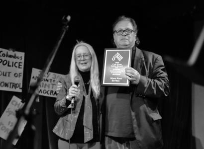 Bob and Mary Jane posing with plaque