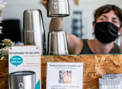 Metal coffee cups at coffeeshop