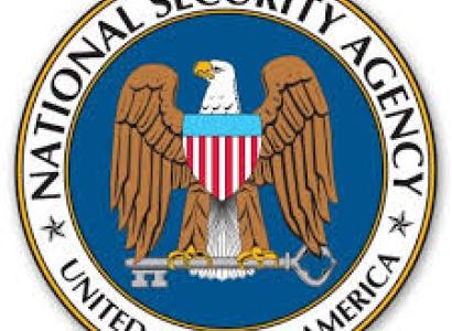 Round circle logo of national security agency with eagle in the middle