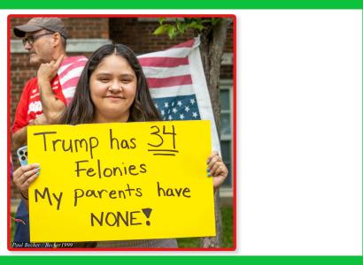Woman with sign saying Trump has 34 felonies, my parents have NONE