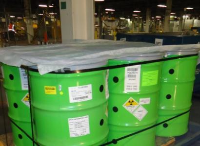 Green toxic waste barrels