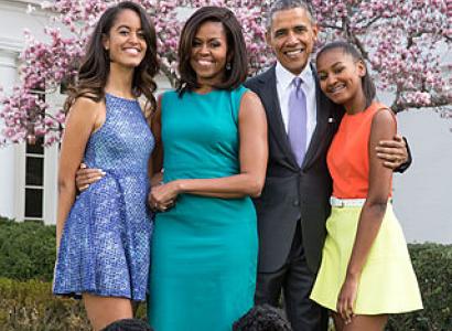 The Obama family posing outside