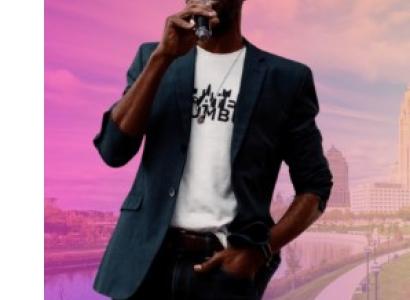 Black man talking into mic