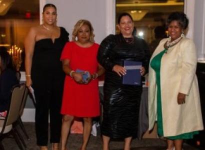 Four women posing