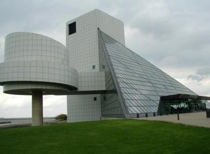 Big concrete structure with roundedness to the buildings and one big triangular side