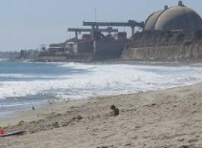 Round topped nuclear plant right on the beach with water coming in