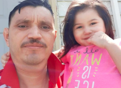 Latino man with little girl