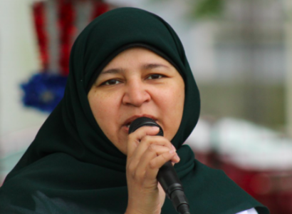 Woman talking into mic