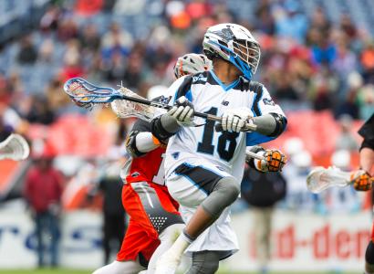 Guy playing lacrosse