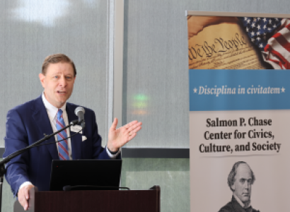 Man speaking at a mic