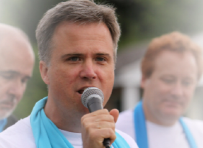 Man talking into a mic