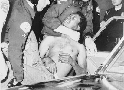 Police strangling a black man at Watts riot