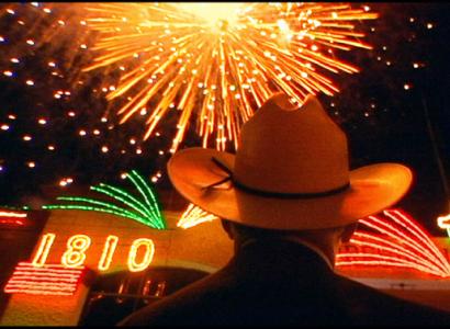 Fireworks and a guy in cowboy hat