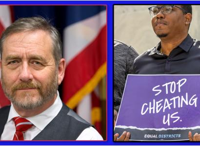 Daidi Yost & guy holding Stop Cheating Us sign