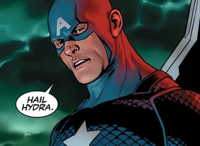 Guy dressed as superhero with star on chest and big A on forehead mask standing against stormy sky saying in a word bubble "Hail Hydra"