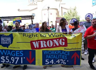 People holding banner