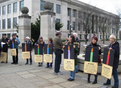 Members of Jewish Voice for Peace hold a symbolic menorah against racism and Islamophobia at the Ohio State University. 