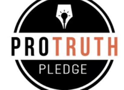Black circle with lightbulb image in middle top, the word Protruth across the middle in black and orange on white and the word pledge in white below