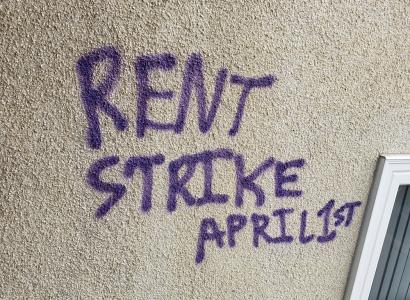Words Rent Strike April 1st scrawled on a wall