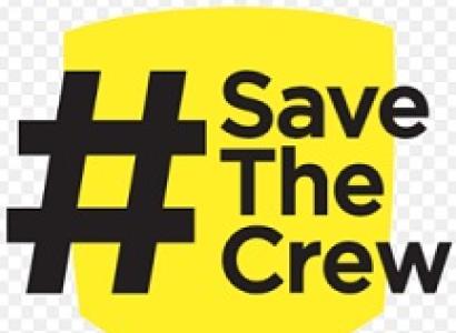Yellow badge symbol and a black hashtag and words Save the Crew