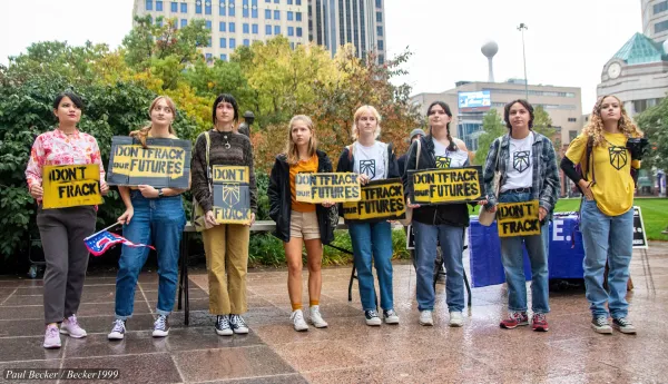 People holding signs