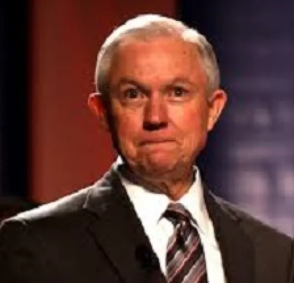 Older man with receding gray hair with a strange look on his face