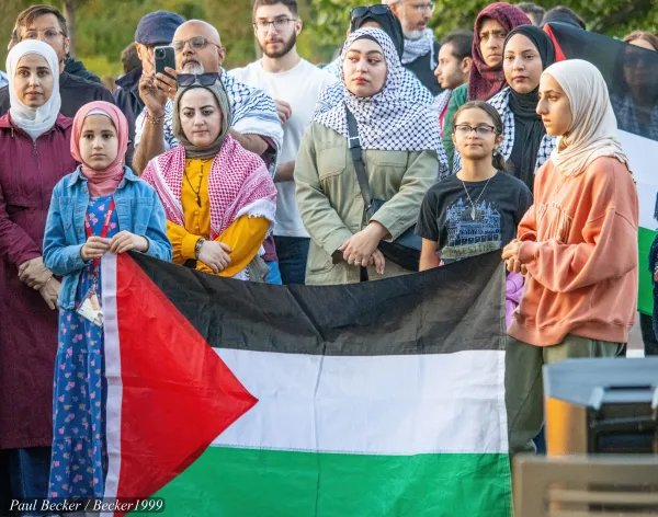 Group of people with a Palestinian flag